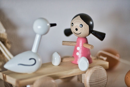Girls with a Goose Pull Along toy. Dievčatko s húskou. — view 2