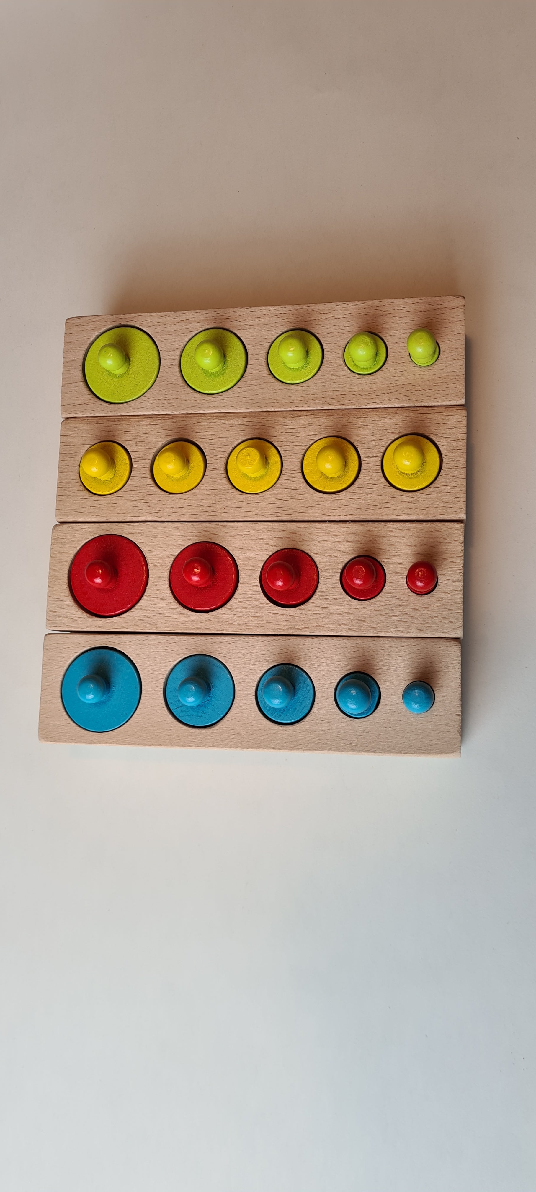 Knobbed Cylinders. Montessori Wooden Cylinders.